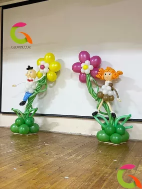 Фигуры из воздушных шаров "Ученик с ученицей на цветах"